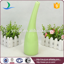 green cylinder glazed ceramic bud vase